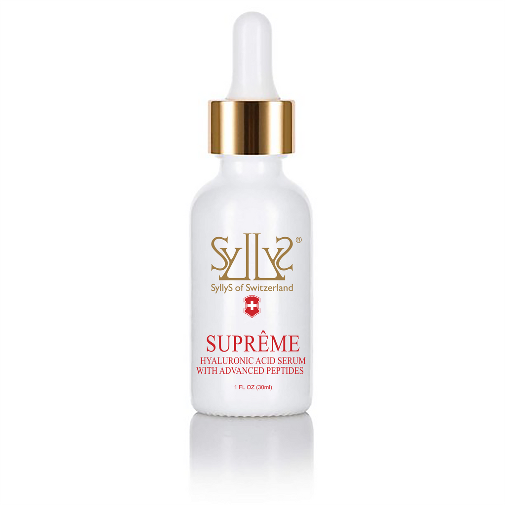 SUPRÊME Serum - Hyaluronic Acid with Advanced Peptides is a translucent treatment serum in a white glass dropper bottle. Dropper is a clear glass with a gold rim, and white top. The logo Syllys of Switzerland is printed in gold on a white label along with the title "SUPRÊME Serum - Hyaluronic Acid with Advanced Peptides" printed in red below the logo. Natural Beauty Made Simple.